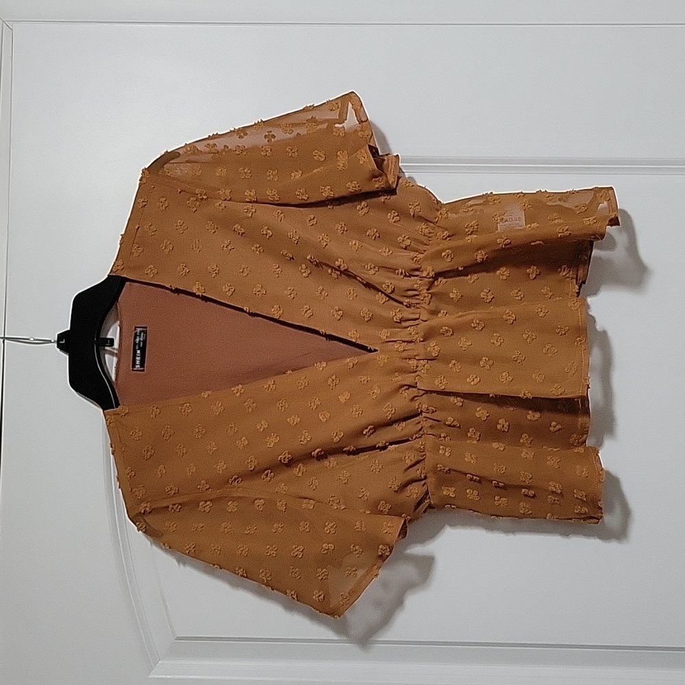 Peplum style women's top